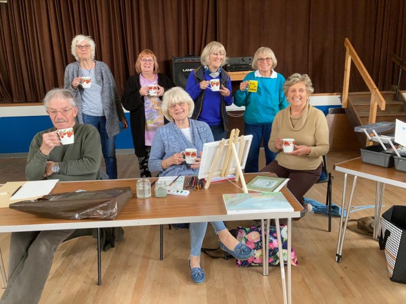 Group of artists at a table